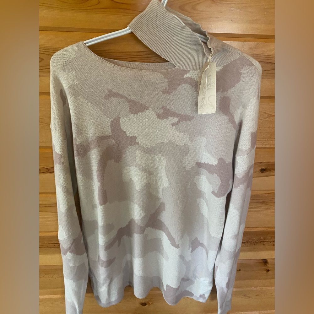 Camo cut out turtleneck sweater. L